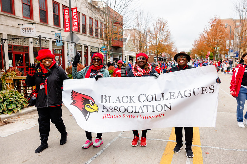 Black Colleagues Association banner carried by four women